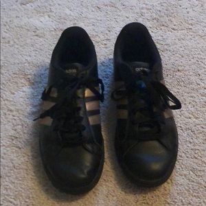 Rose gold and black Adidas sneakers